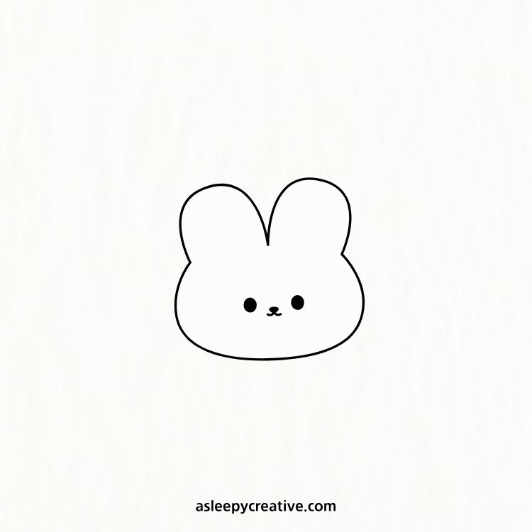 Simple round bunny head with dot eyes and small mouth, drawn in black lines on a white background.